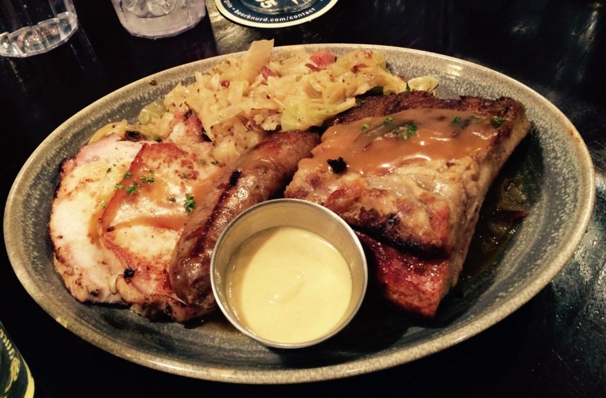 Swine Platter- ribs, pork loin, bratwurst, beer braised cabbage, applewood bacon