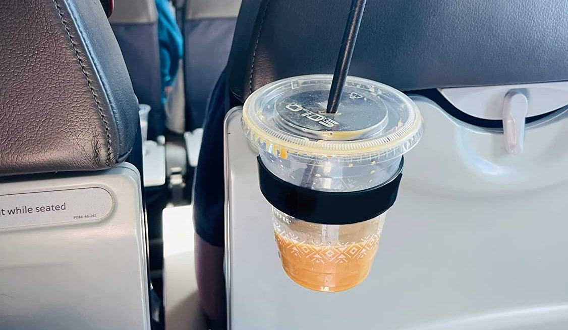 Cup Holder on Airplane Seat Stock Image - Image of drink, beverage:  142104475